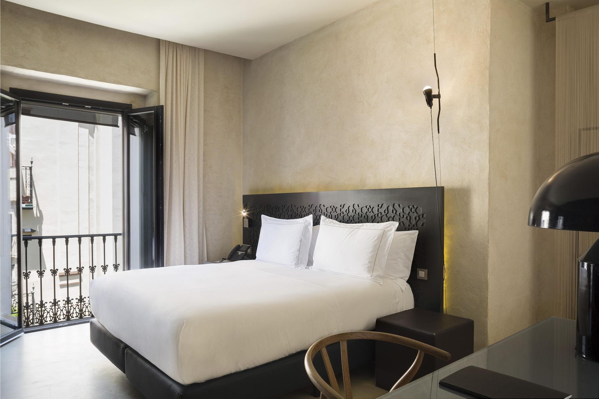 Eme Catedral Mercer Hotel Sevilla Exterior foto A room at the hotel