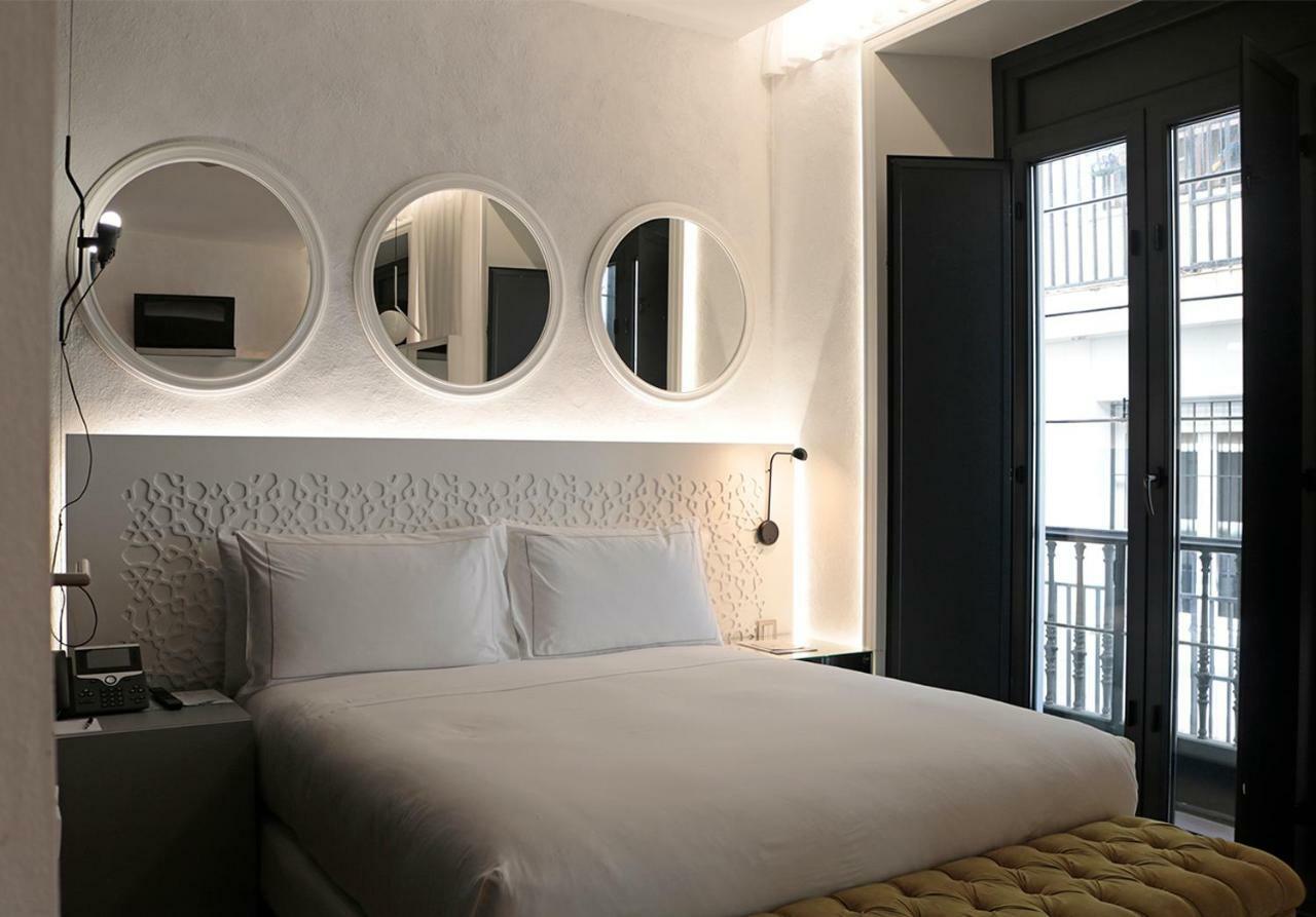 Eme Catedral Mercer Hotel Sevilla Exterior foto A room at the hotel