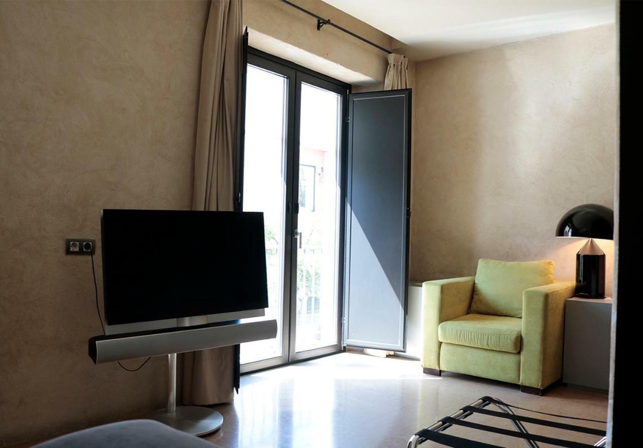 Eme Catedral Mercer Hotel Sevilla Exterior foto A room at the hotel